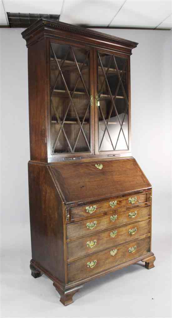 Appraisal: A George III mahogany bureau bookcase with two astragal glazed