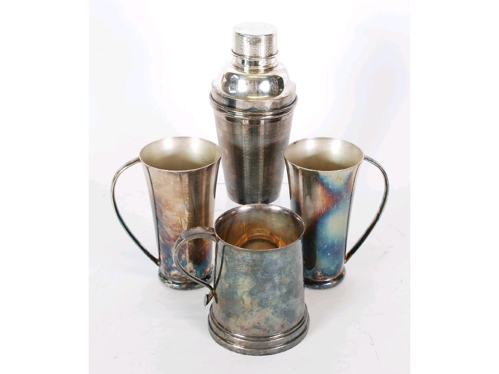 Appraisal: ELECTROPLATED ENGINE TURNED COCKTAIL SHAKER typical form with flat pull