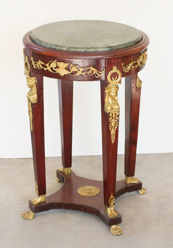 Appraisal: FRENCH EMPIRE STYLE MARBLE TOP STAND Inset green variegated round