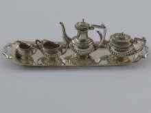 Appraisal: A miniature silver four piece tea and coffee set on