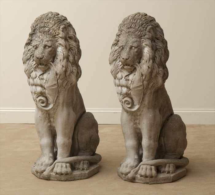 Appraisal: PAIR OF CAST STONE LIONS Each modeled seated facing forward