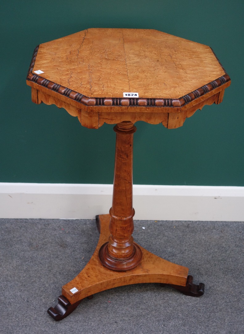 Appraisal: A Victorian bird's eye maple occasional table the octagonal top