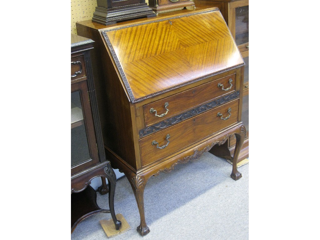 Appraisal: Slopefront writing bureau