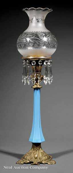 Appraisal: An American Gilt Bronze and Opaline Glass Solar Lamp mid-