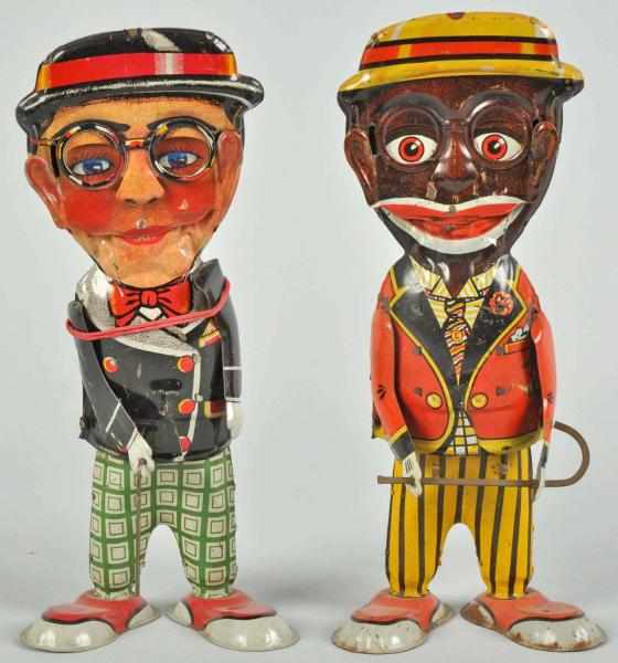 Appraisal: Lot of Tin Litho Marx Walker Wind-Up Toys Description American