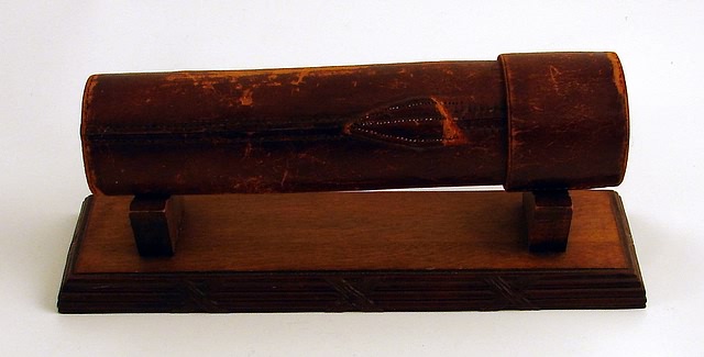 Appraisal: Plaited leather grip l closed including wood stand Ship plus