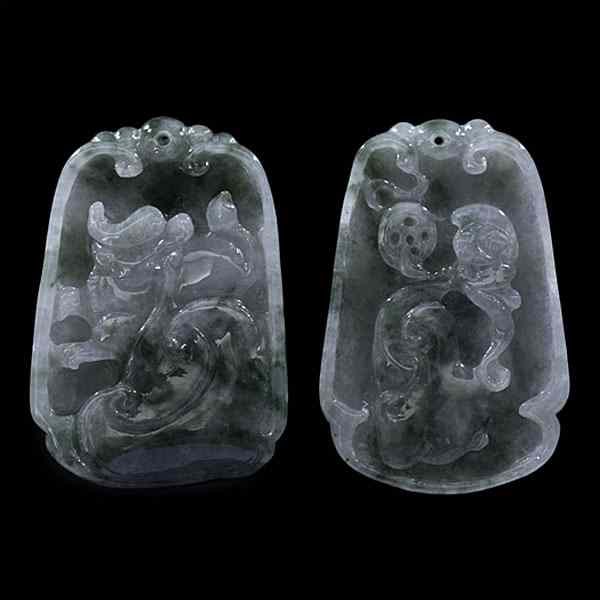 Appraisal: Chinese Jade Pendants Chinese th century Two spinach and white