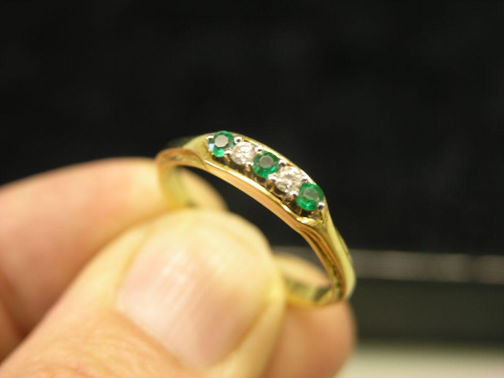 Appraisal: An ct gold ring set with two small diamonds and