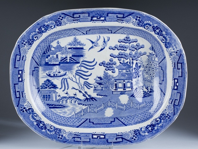 Appraisal: Blue and White Transferware Meat Platter with Well Asian village