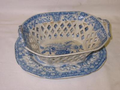 Appraisal: AN ENGLISH PEARLWARE CHESTNUT BASKET ON STAND with trellis pierced