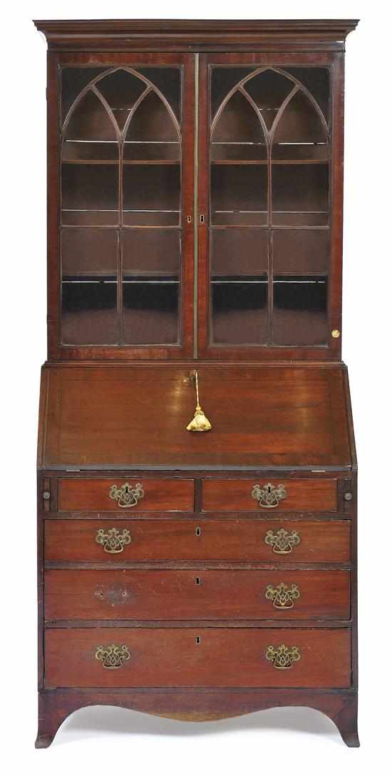 Appraisal: A GEORGE III MAHOGANY SECRETAIRE BOOKCASE OF COMPACT PROPORTIONS The