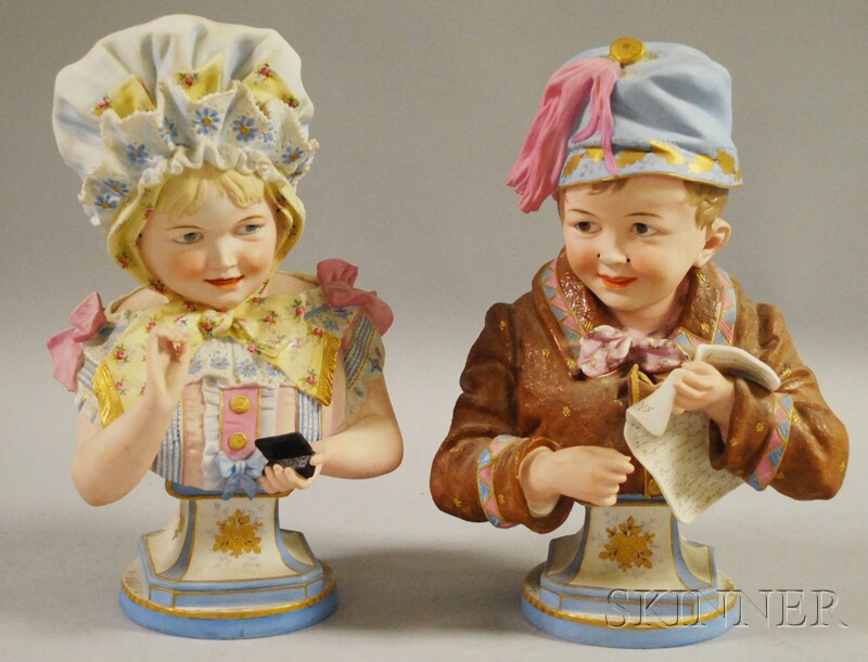 Appraisal: Pair of Painted Bisque Busts of a Boy with New