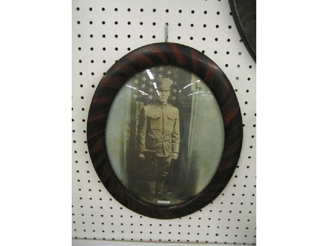 Appraisal: W W I Military Photograph of a Soldier oval convex