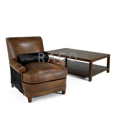 Appraisal: DESIGNER Club chair and coffee table th c Leather hide