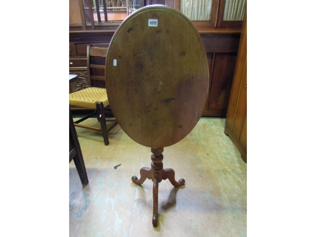 Appraisal: A Victorian mahogany tilt top occasional table of oval form