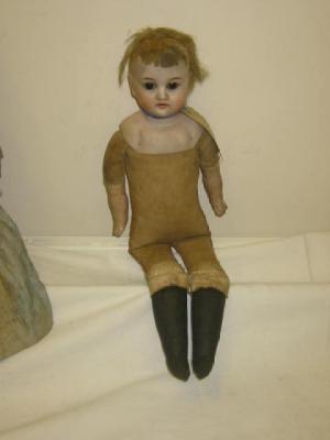 Appraisal: A Cuno Otto Dressel bisque shoulder head girl doll with