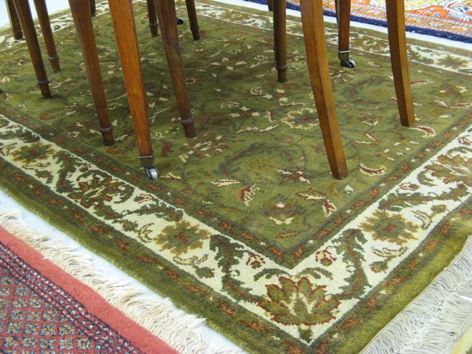 Appraisal: TWO ORIENTAL AREA RUGS Indo-Persian both overall floral design one