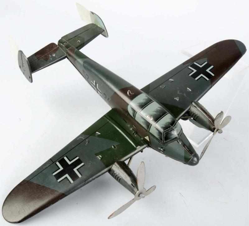 Appraisal: Tin Litho Tippco Airplane Wind-Up Toy German Scarce twin engine