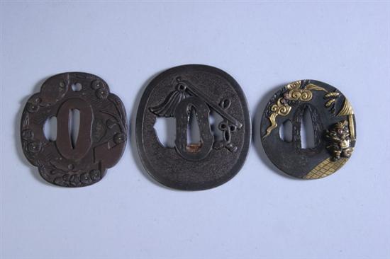 Appraisal: THREE JAPANESE IRON TSUBA SWORD GUARDS Edo period th -