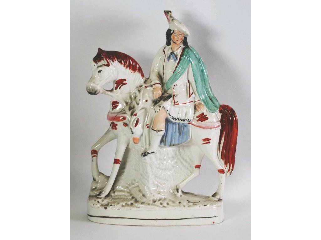 Appraisal: NINETEENTH CENTURY STAFFORDSHIRE FLAT LARGE POTTERY EQUESTRIAN FIGURE carrying a