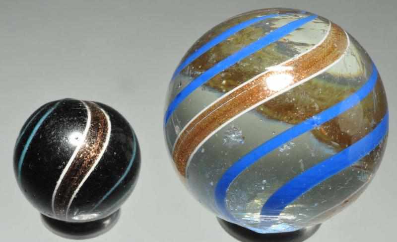 Appraisal: Lot of Lutz Marbles Description Smallest is a banded black