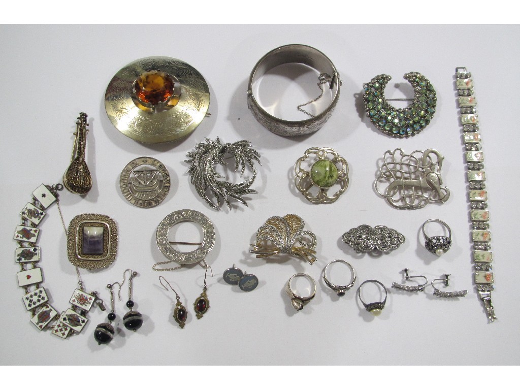 Appraisal: Lot comprising an enamel plaque playing cards bracelet marcasite brooches