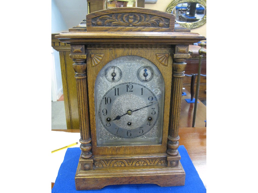 Appraisal: Oak cased chiming mantle clock with reeded columns