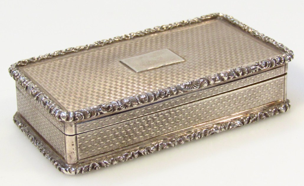 Appraisal: A George IV silver snuff box the rectangular outline with