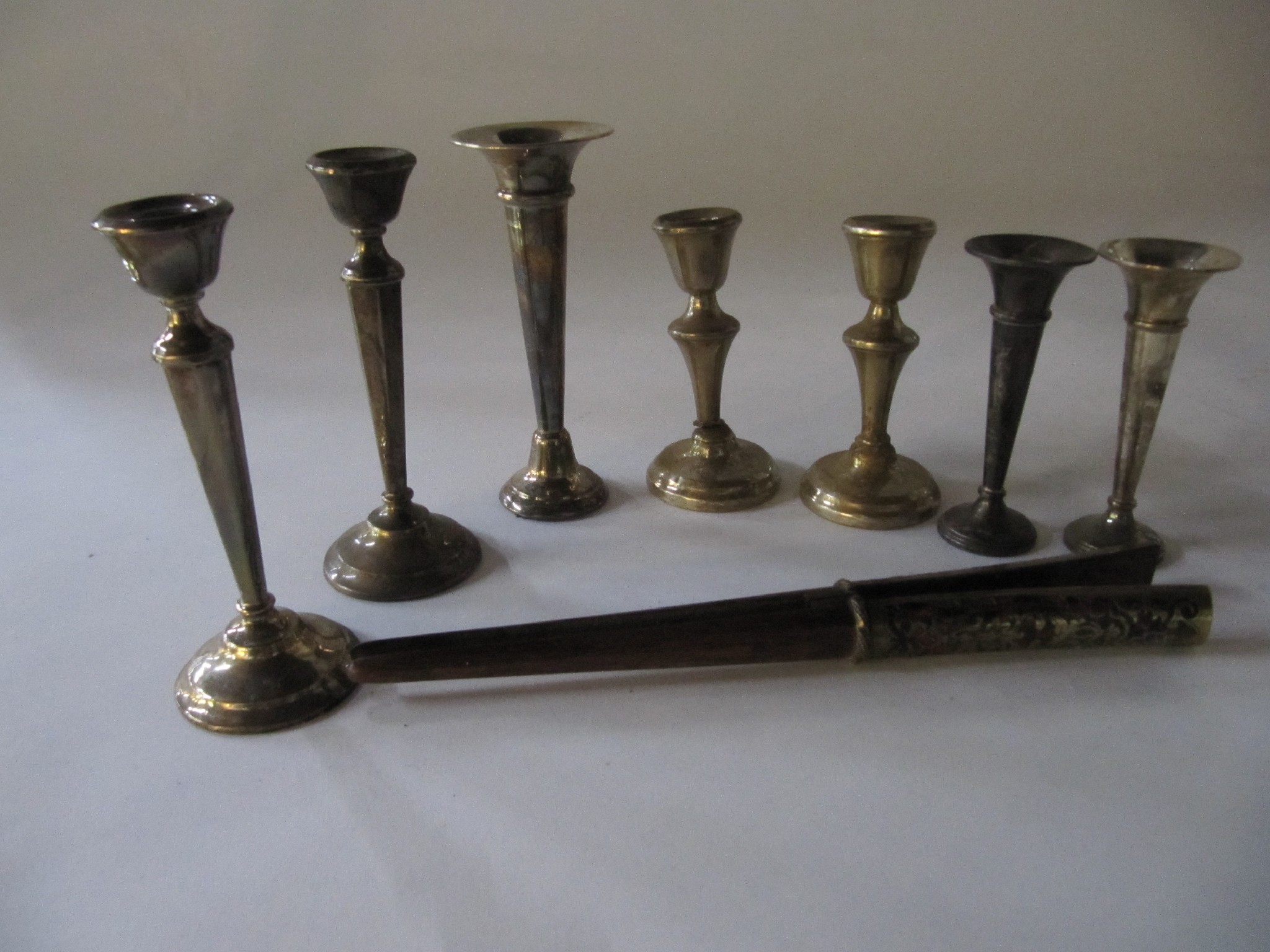 Appraisal: A lot comprising two pairs of silver candlesticks a pair