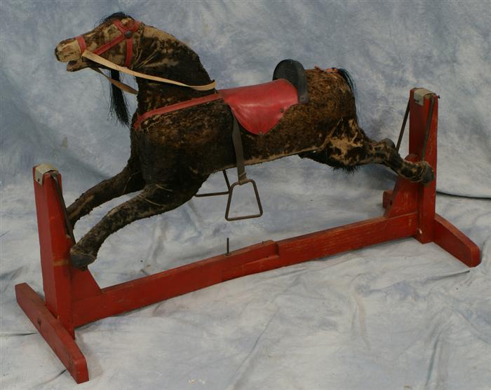 Appraisal: Brown felt covered gliding horse considerable wear English c long