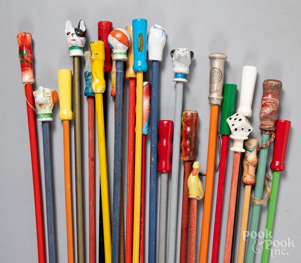 Appraisal: Collection of twenty-four carnival canes Collection of twenty-four carnival canes