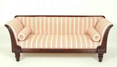 Appraisal: A MAHOGANY SOFA upholstered in pink and cream striped covering