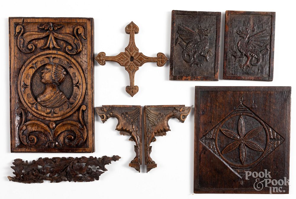 Appraisal: Continental carved oak plaques and ornaments Group of Continental carved