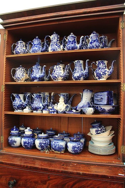 Appraisal: A LARGE QUANTITY OF BLUE AND WHITE POTTERY COFFEE POTS