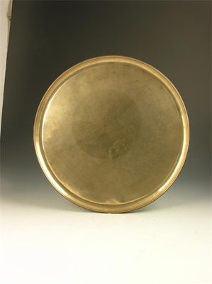 Appraisal: A circular bell metal tray in cm dia