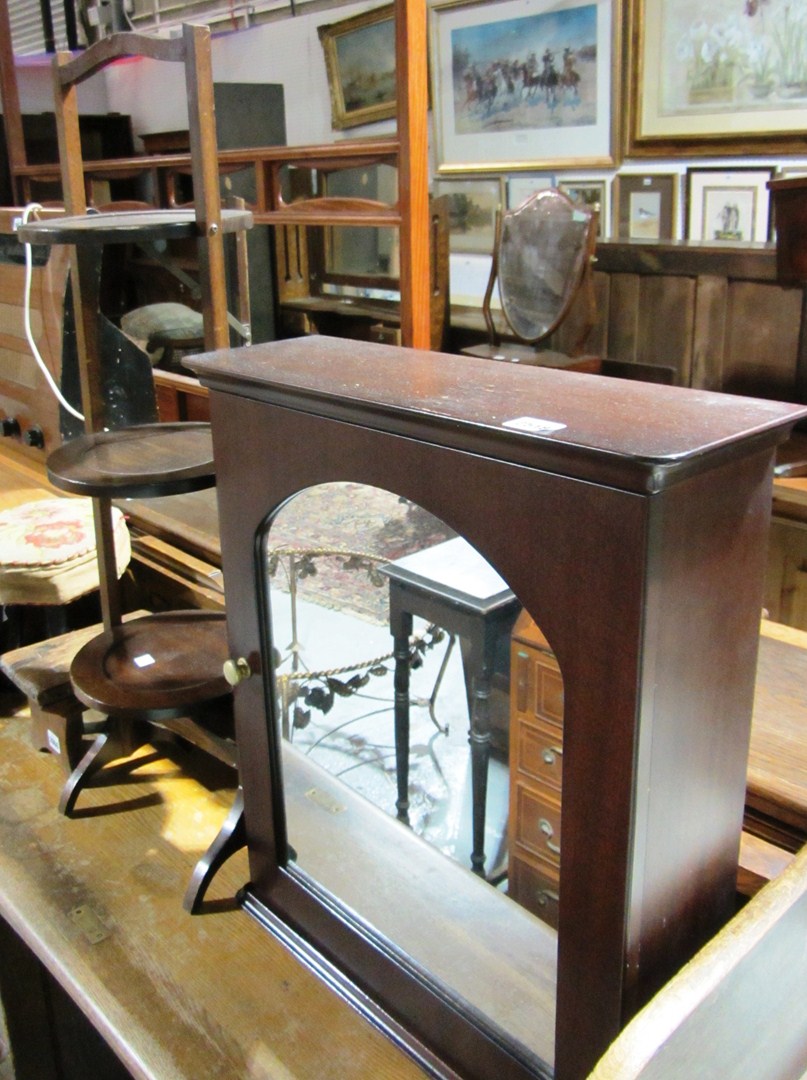 Appraisal: A th century mahogany wall cabinet and a folding cake