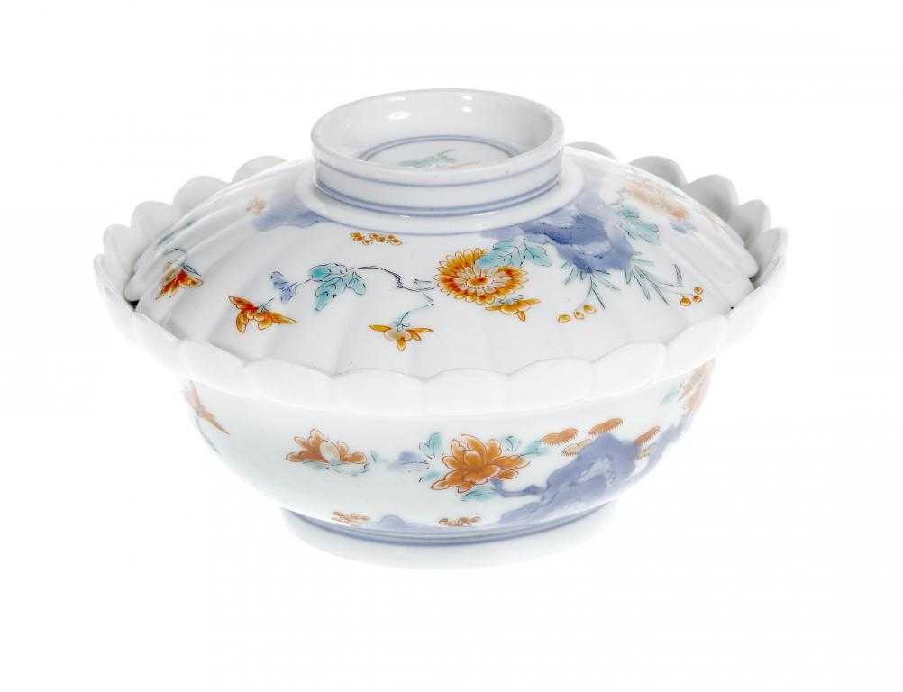 Appraisal: A KAKIEMON CHRYSANTHEMUM LOBED BOWL AND COVER painted in underglaze