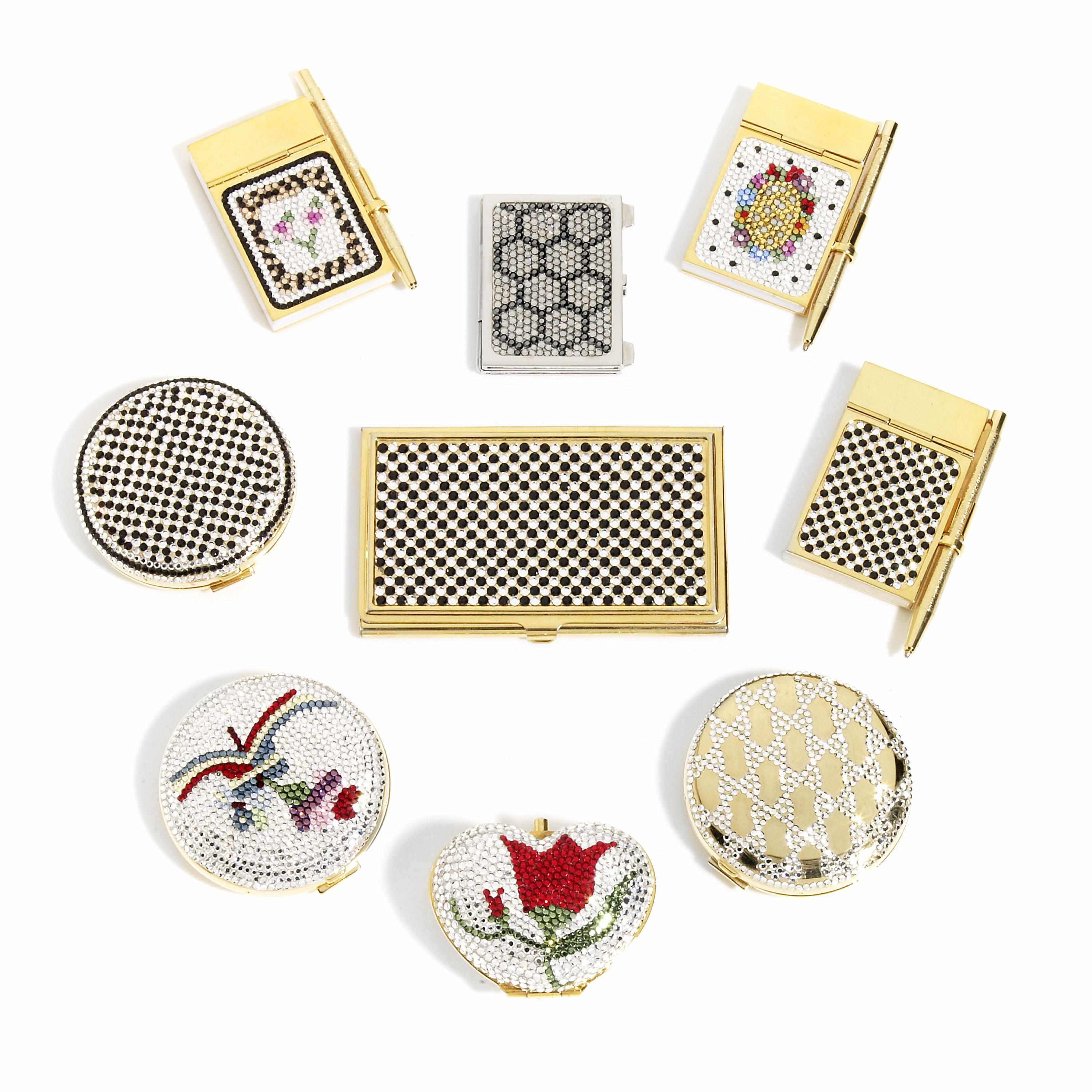 Appraisal: A collection of crystal accessories comprising mini notepads picture frame