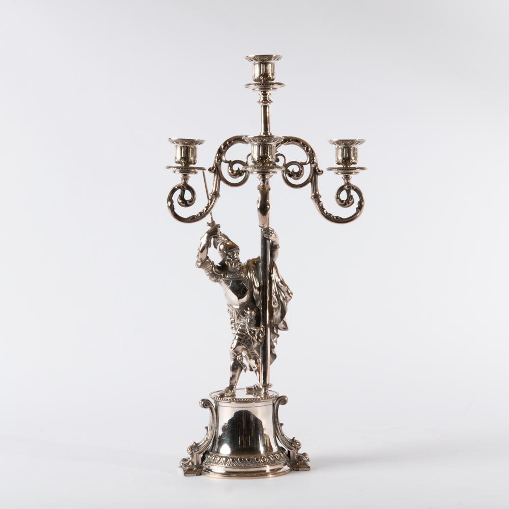 Appraisal: ELKINGTON 'CONQUISTADOR' FINE SILVER-PLATE CANDELABRA A finely cast sculptural four-candle