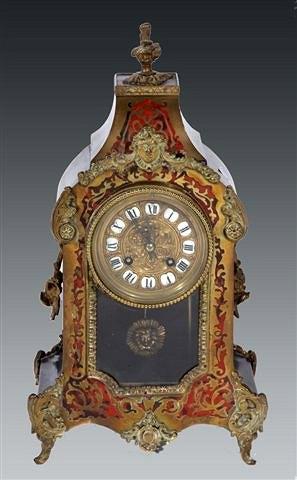 Appraisal: A TH CENTURY BOULLE MANTEL CLOCK with flame finial enamel