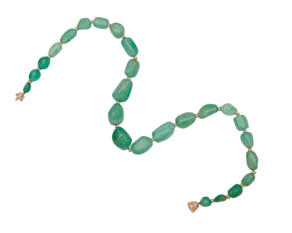 Appraisal: K Gold Emerald and Diamond Necklace featuring graduated tumbled emeralds