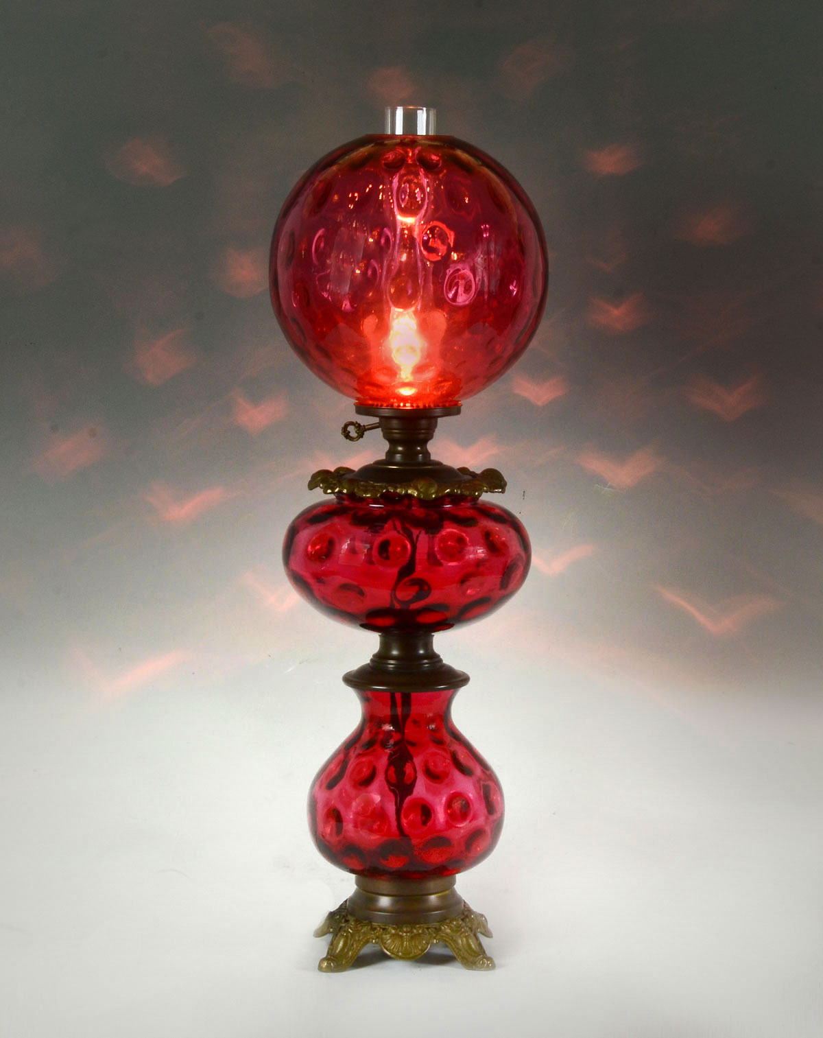 Appraisal: LARGE CRANBERRY GLASS HURRICANE LAMP Cranberry glass hurricane lamp having