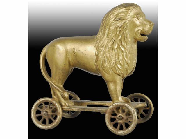 Appraisal: Cast Iron Lion on Wheels Still Bank Description Made by