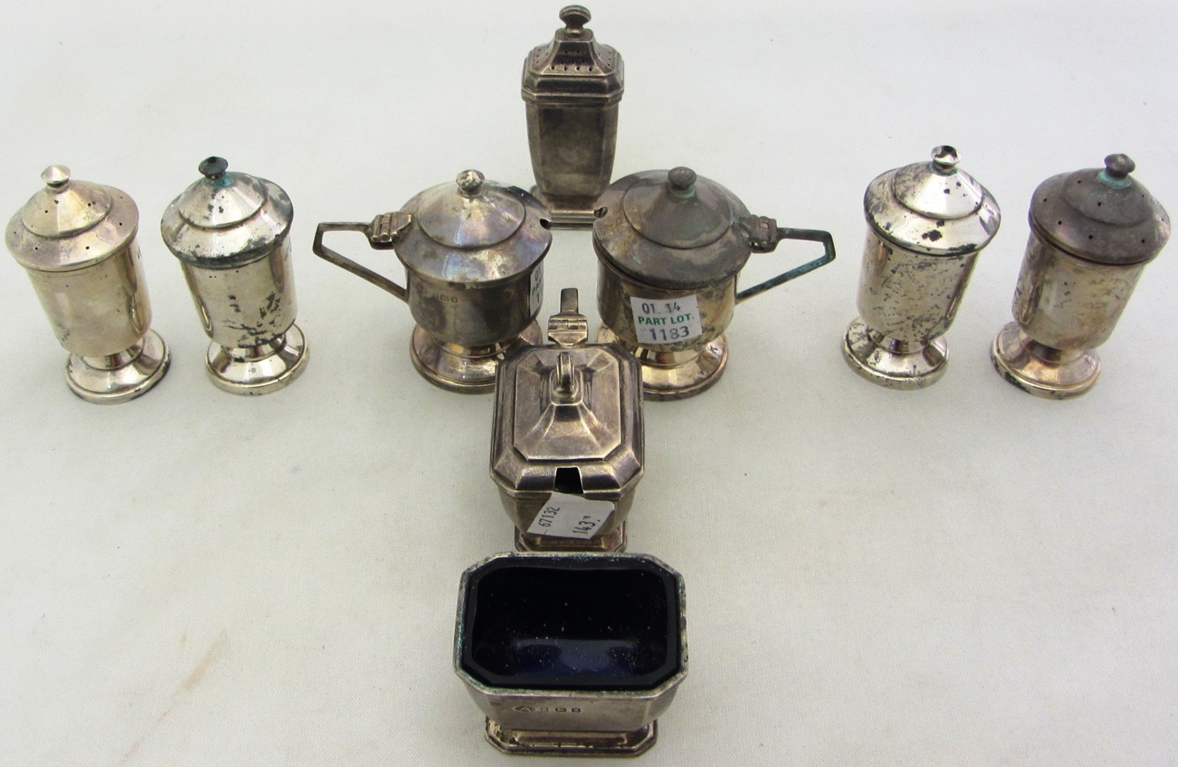 Appraisal: A silver six piece condiment set of tapering cylindrical Art