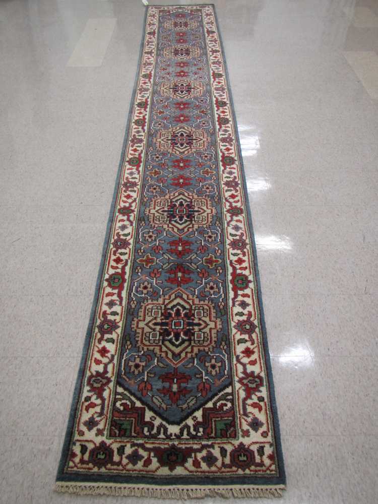 Appraisal: HAND KNOTTED ORIENTAL RUNNER Persian Serapi design of repeating geometric