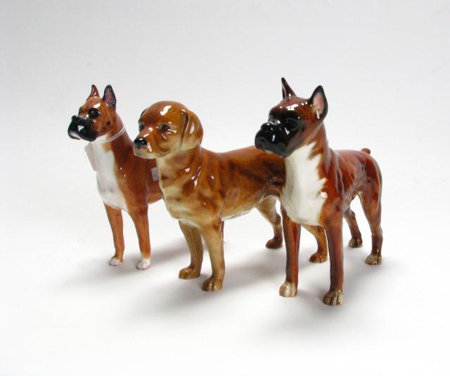 Appraisal: Group of Three Porcelain Dog Figures including a Goebel Boxer