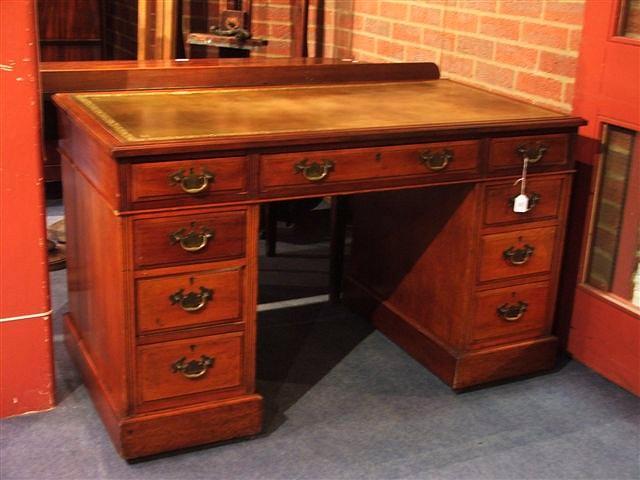 Appraisal: A LATE VICTORIAN MAHOGANY PEDESTAL DESK the top with gilt