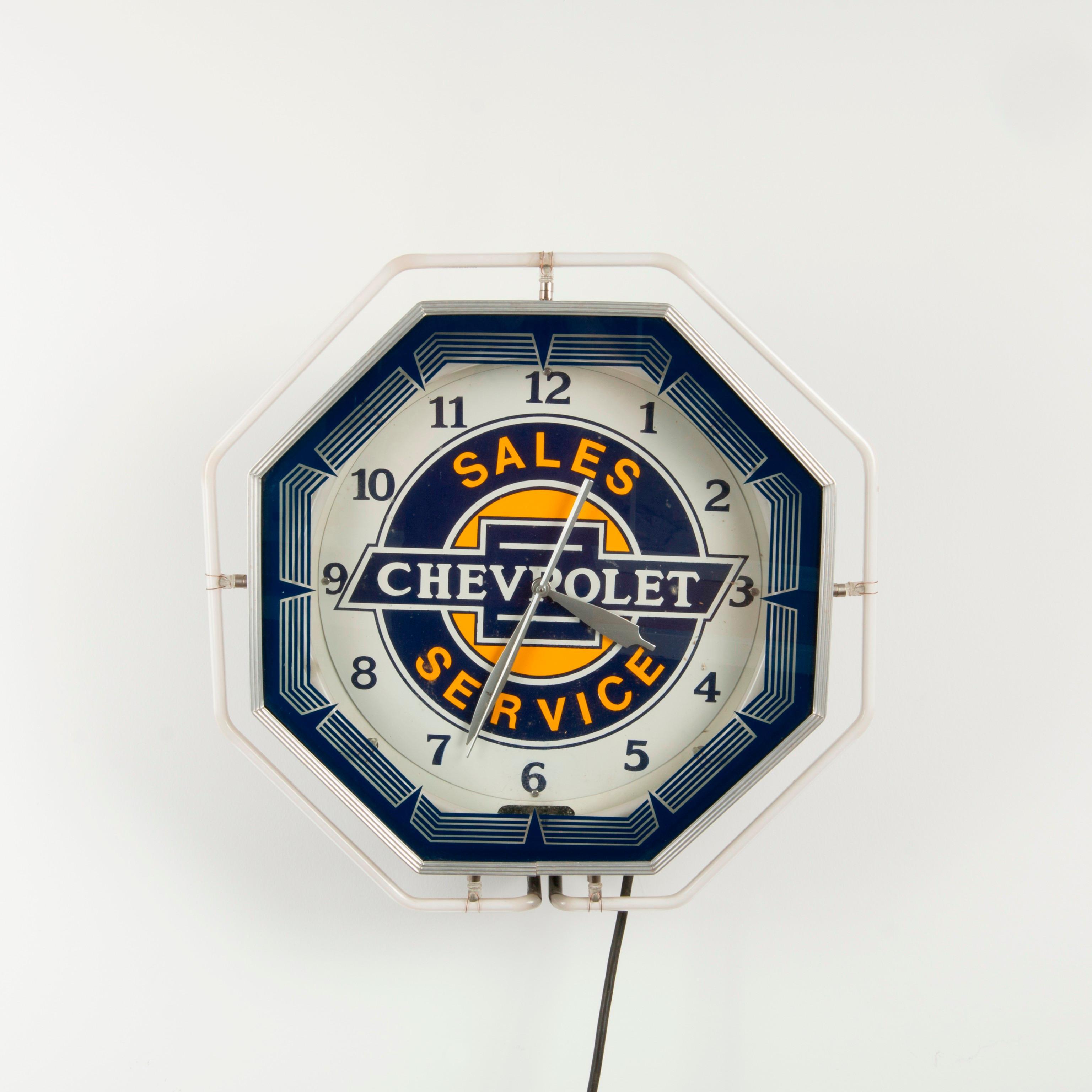 Appraisal: VINTAGE CHEVROLET SALES SERVICE NEON CLOCK An octagonal Chevrolet Sales