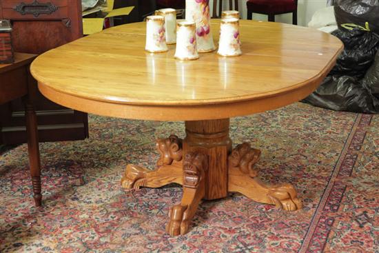 Appraisal: PEDESTAL TABLE Reproduction oak table having a circular top and