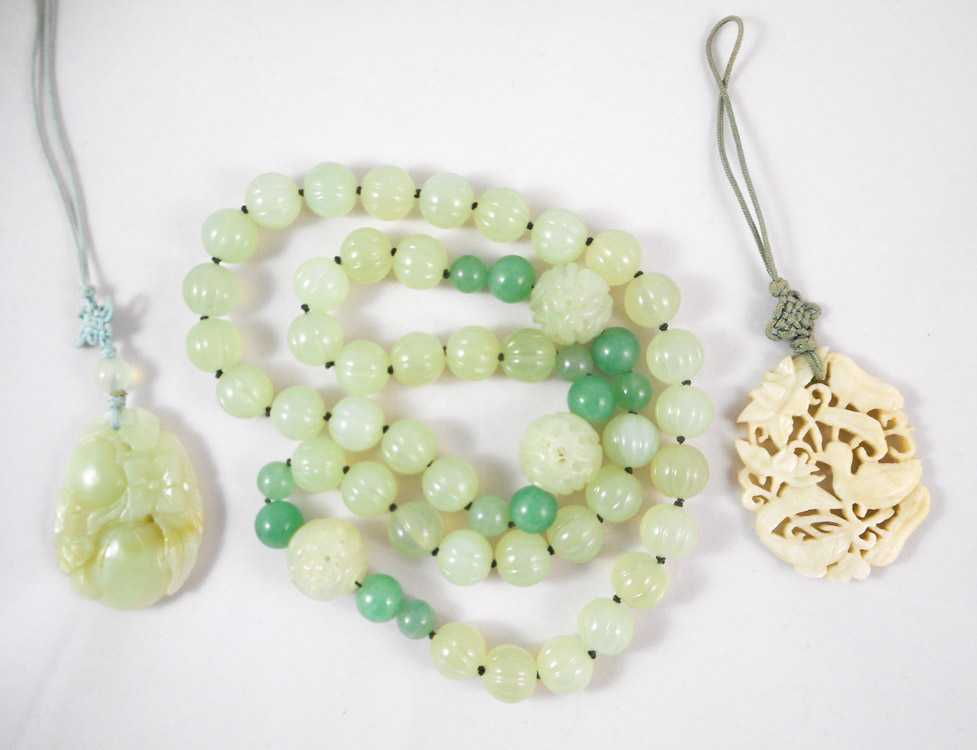 Appraisal: THREE ARTICLES OF JADE JEWELRY including a inch necklace strung